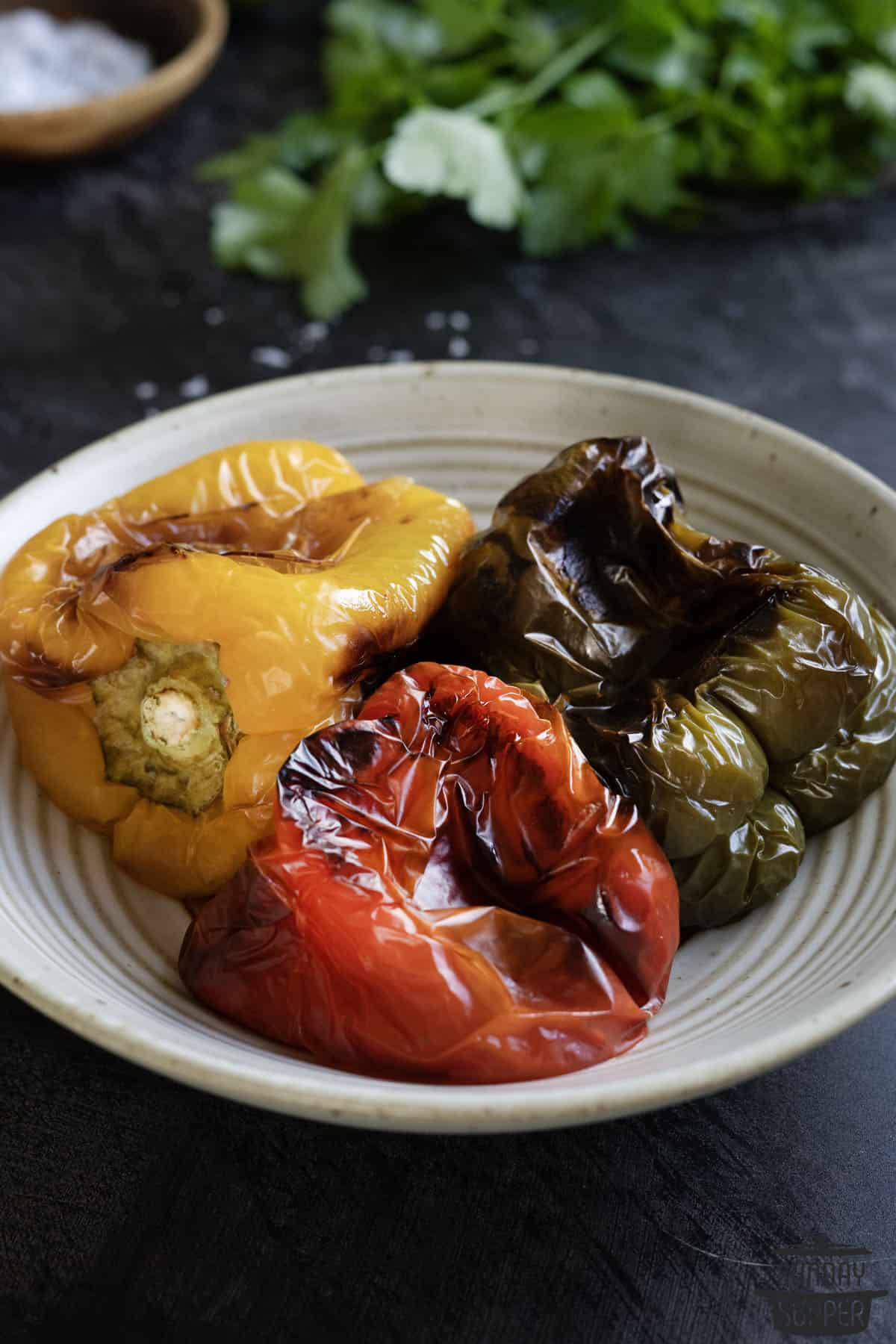 a set of roast peppers on a plate