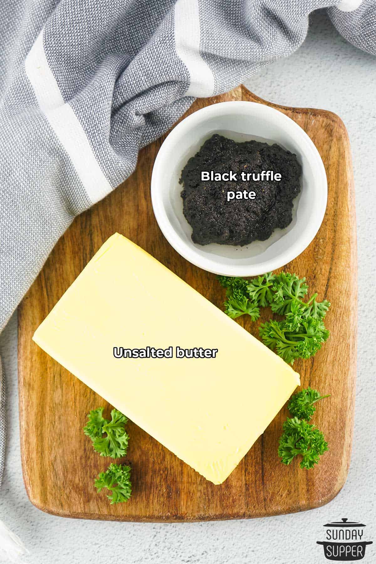 the ingredients for black truffle butter with labels