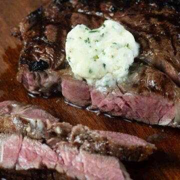 chuck steak with compound butter on top
