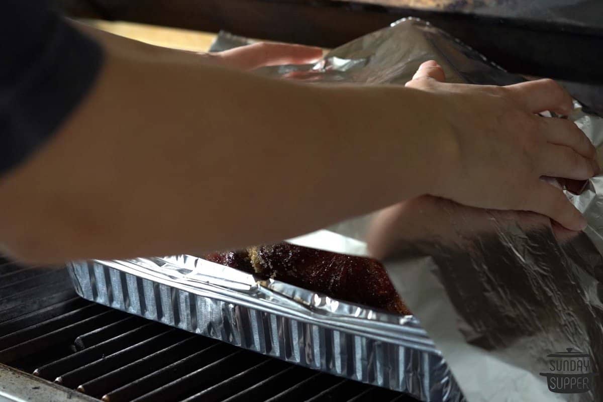 placing foil over the top of grilled ham