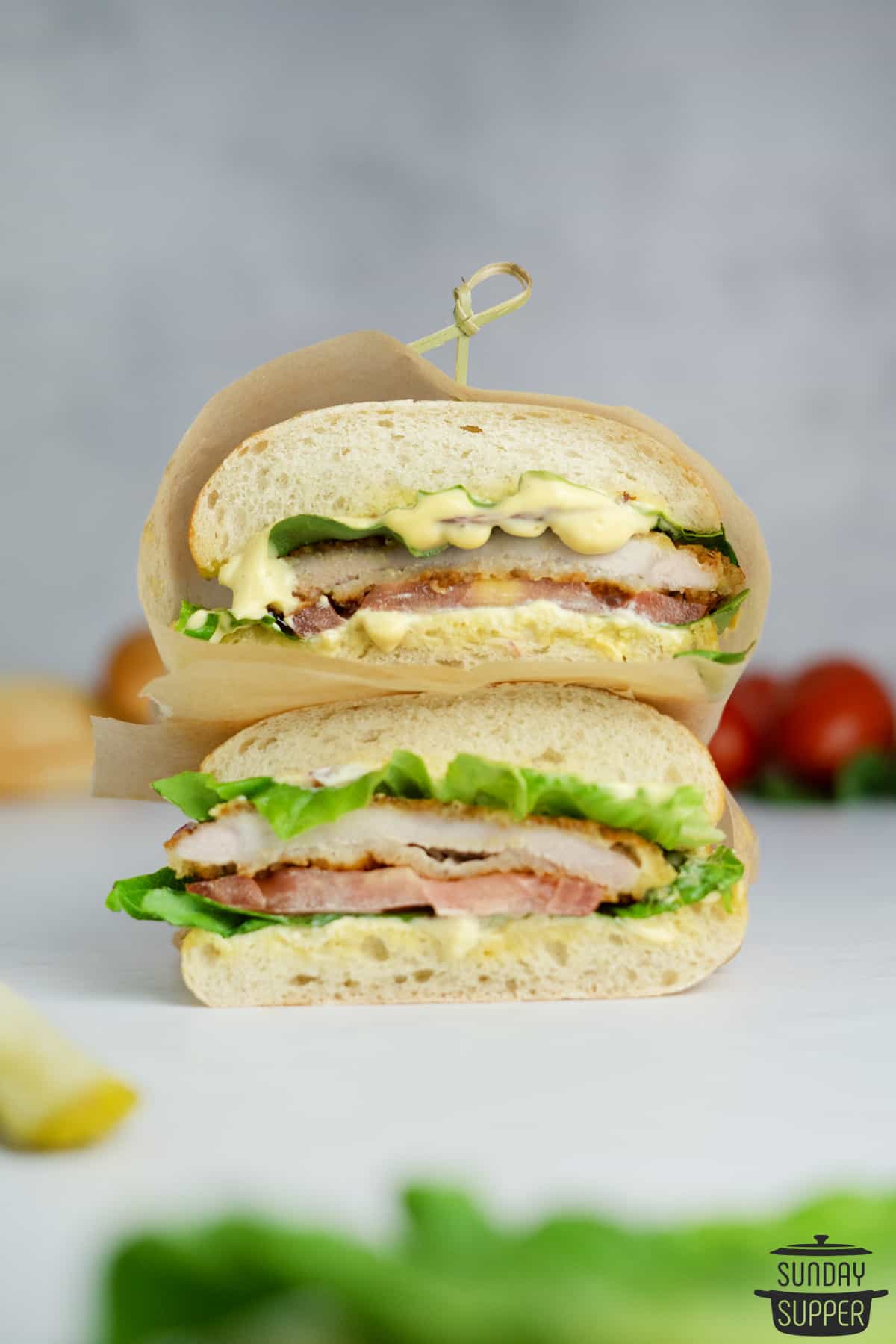 pork chop sandwich cut in half