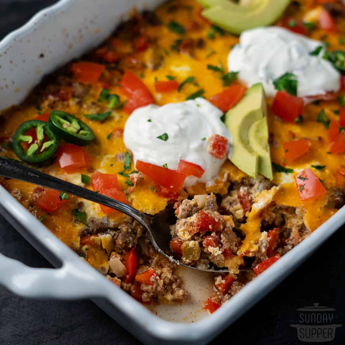 close up of taco casserole in a spoonful