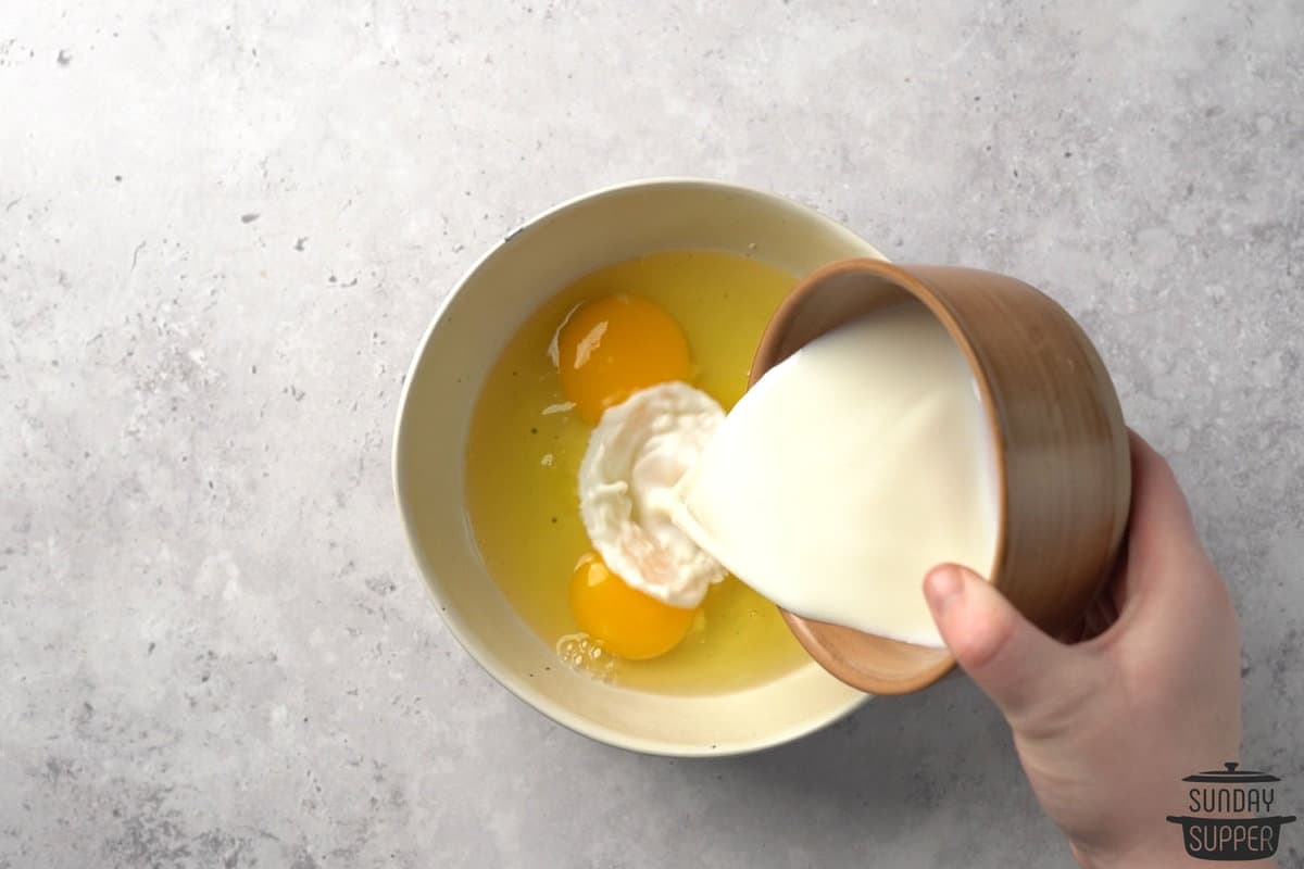 mixing together eggs and cream