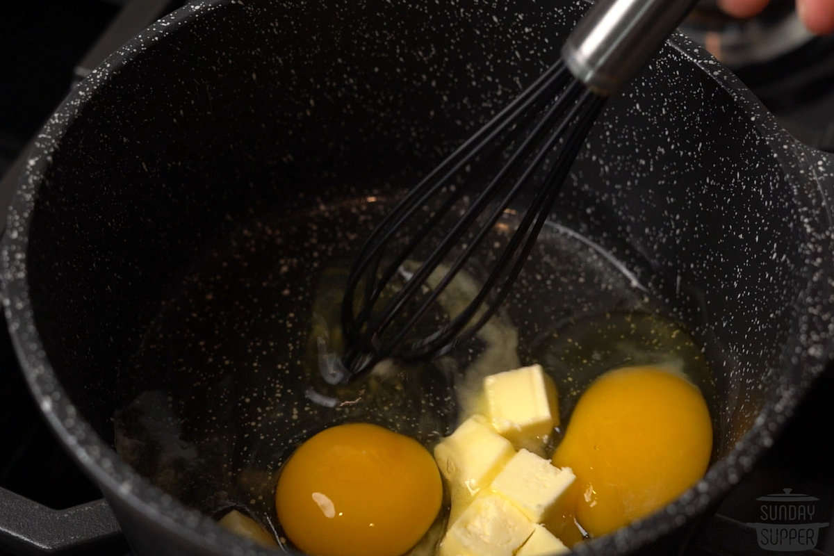 whisking the butter and eggs together