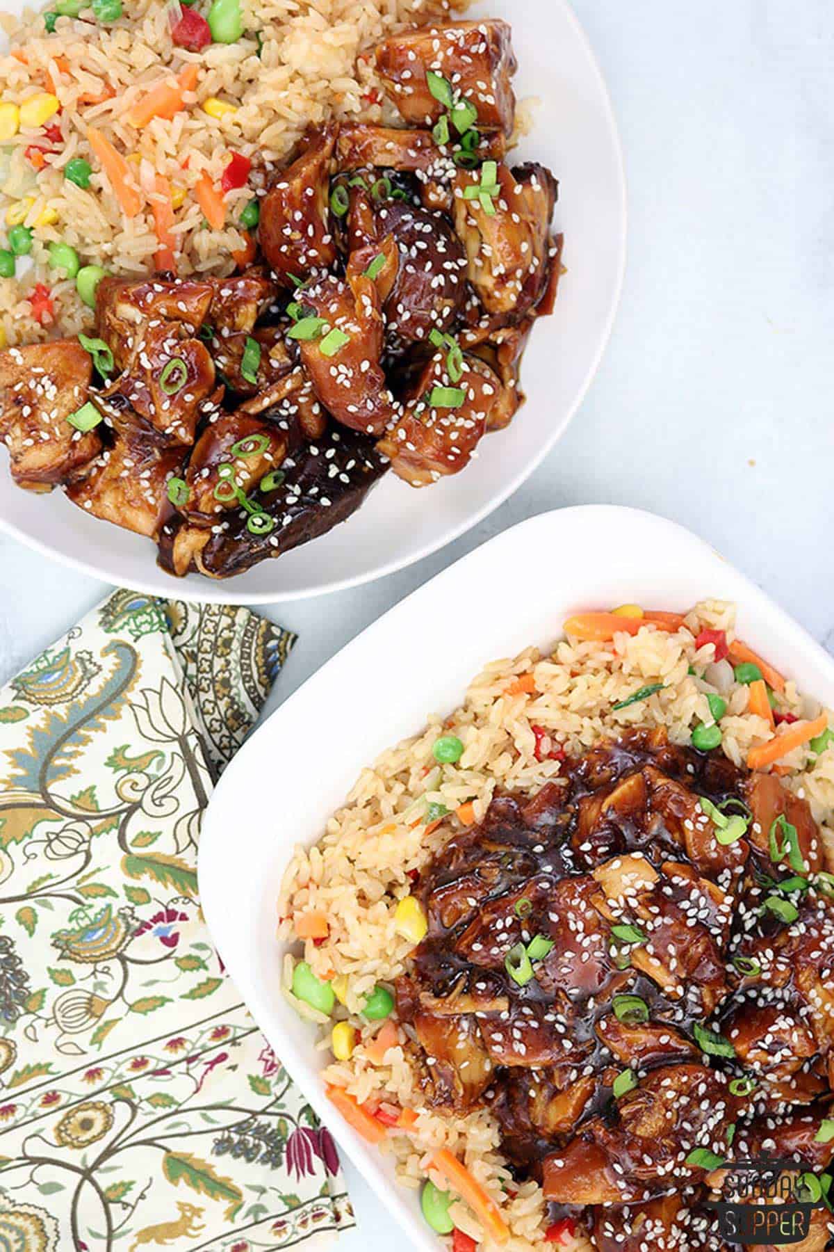 two plates of rice and honey sesame chicken