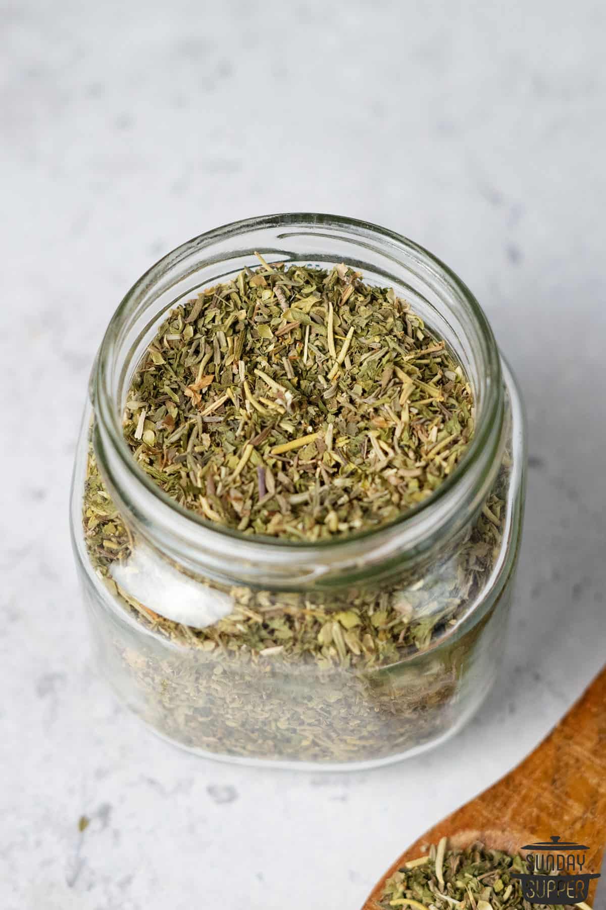 a spice jar filled with italian seasoning