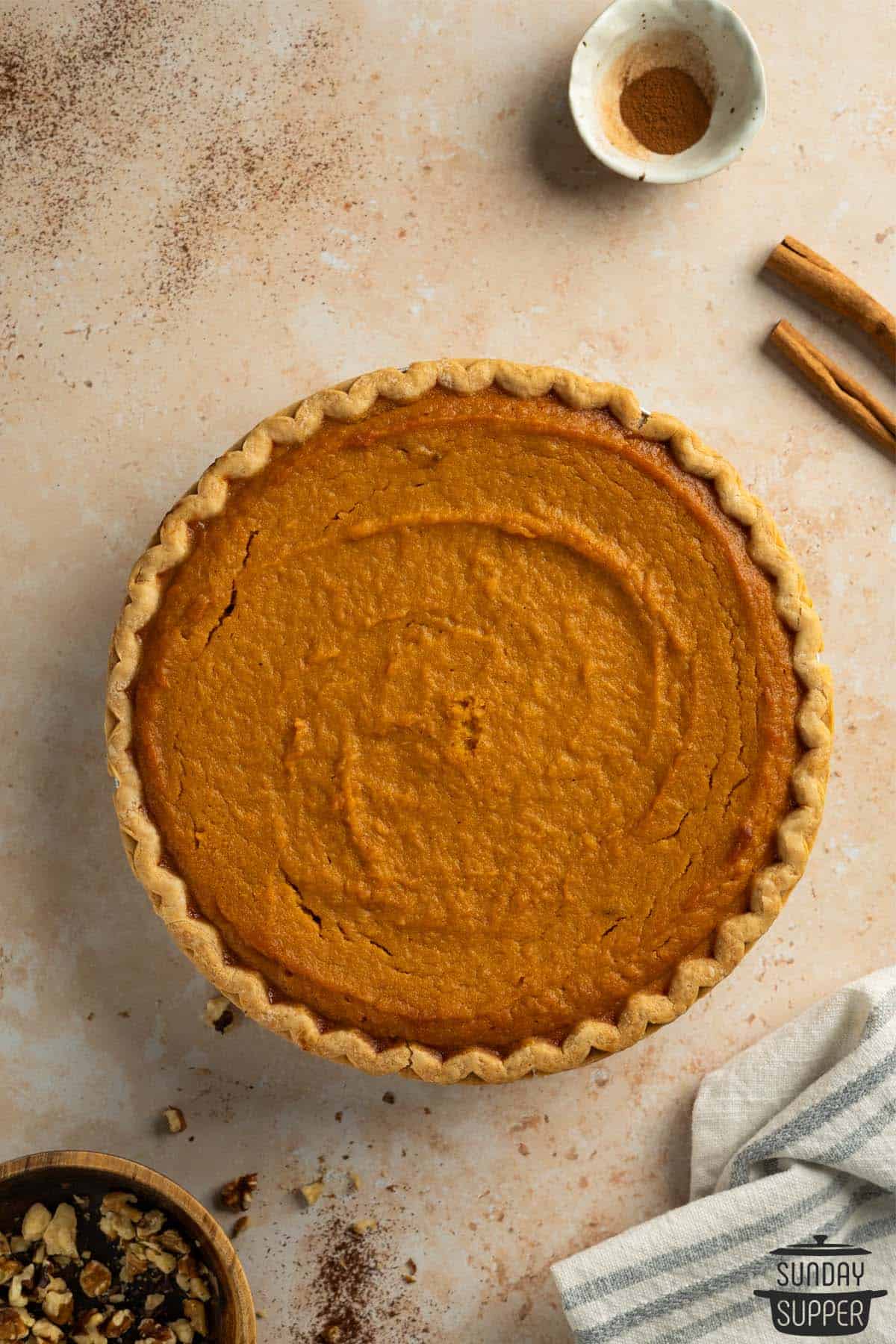 a fully baked sweet potato pie with extra cinnamon