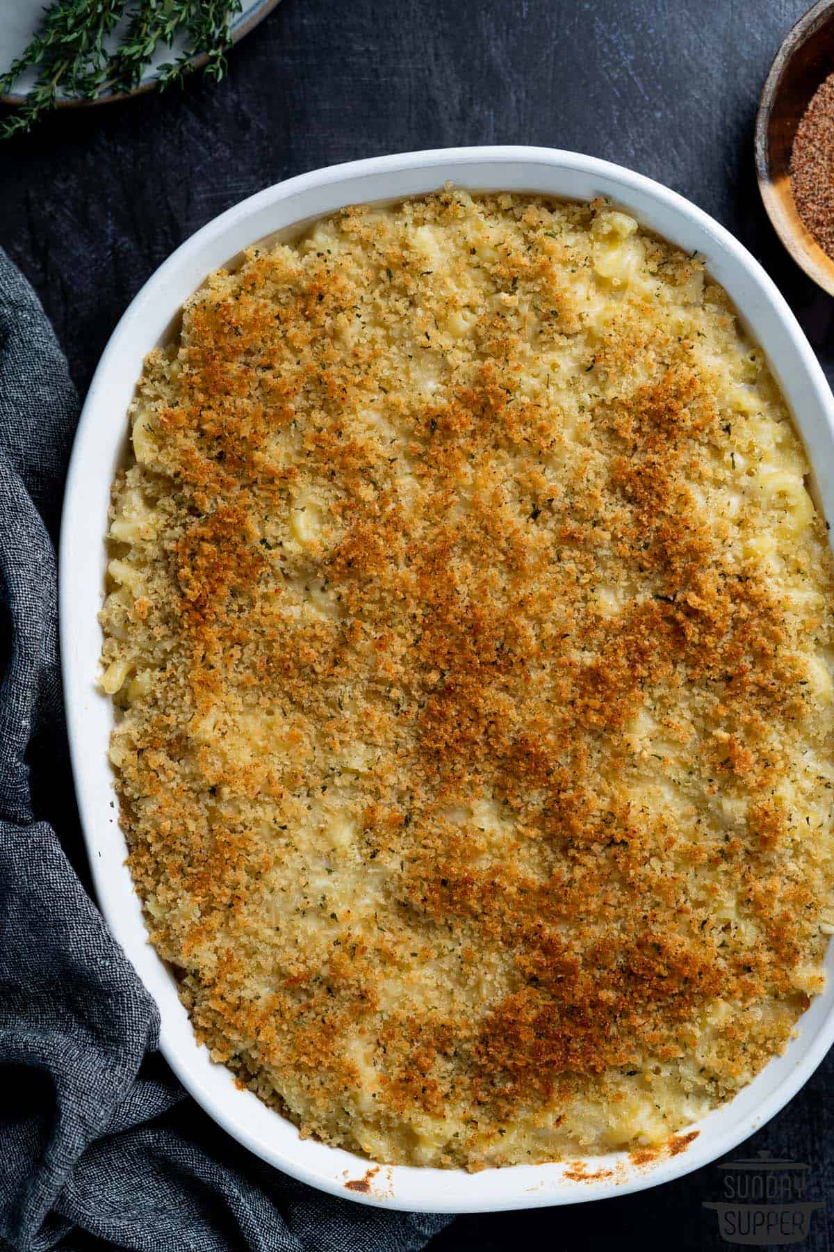 truffle macaroni and cheese in a white casserole dish