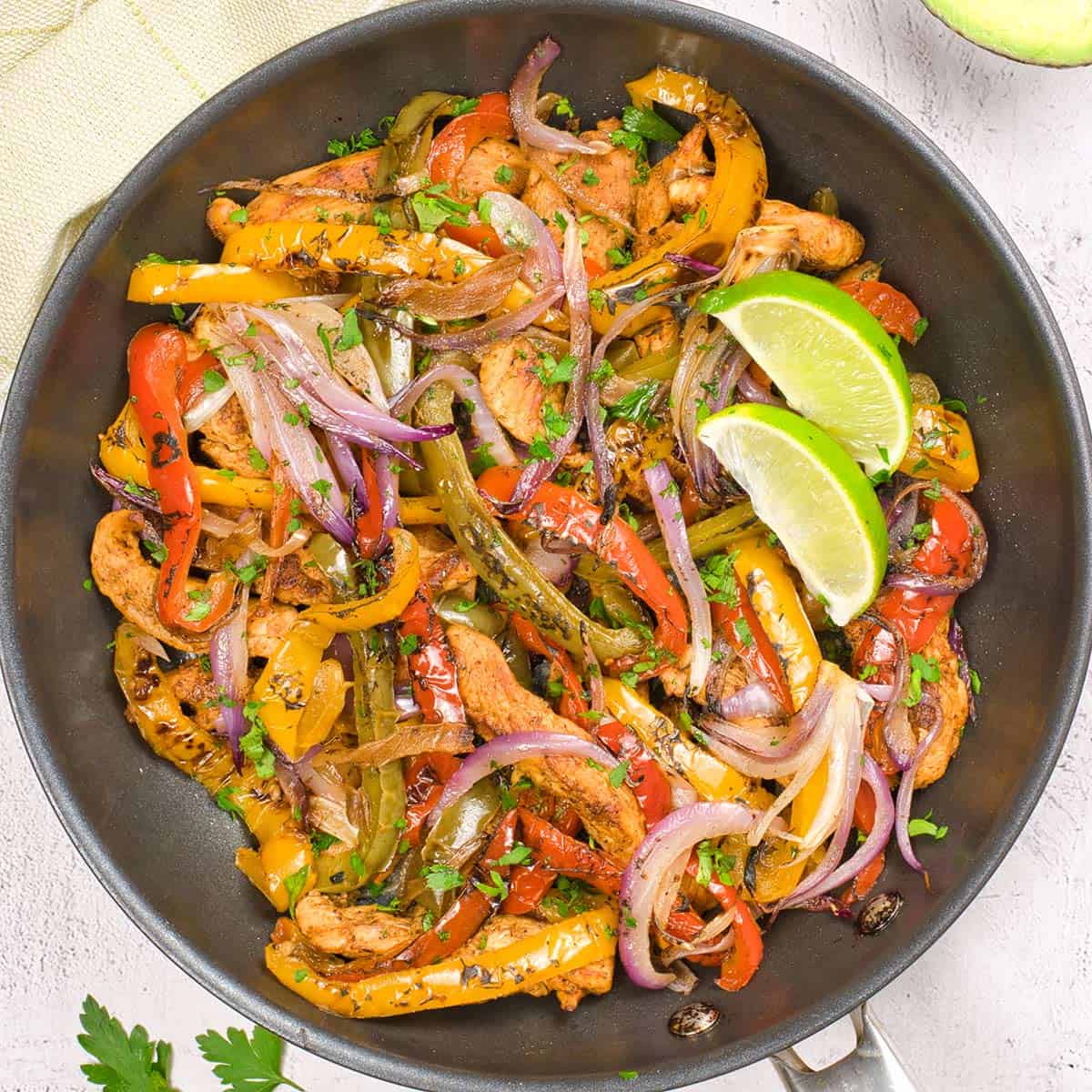 a pan of finished chicken fajitas