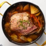 the corned beef in a pot with veggies