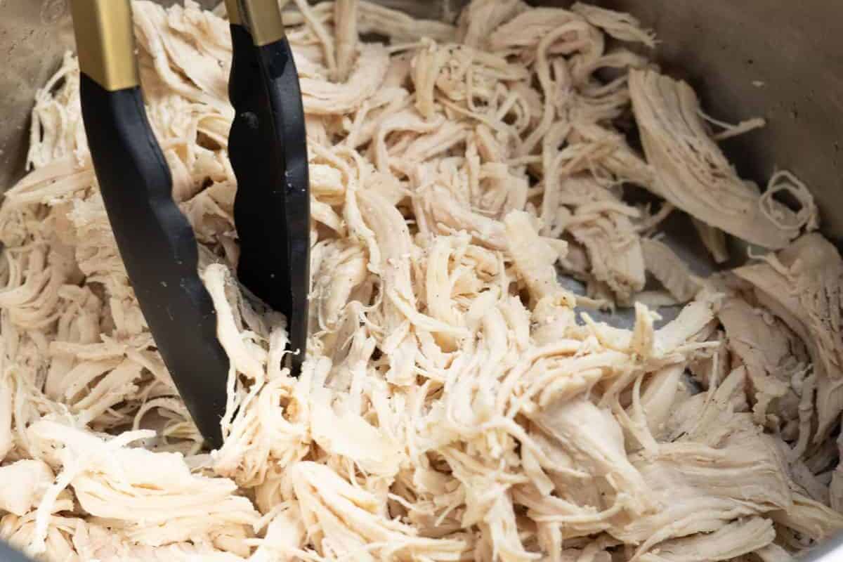 shredded chicken inside of a pot