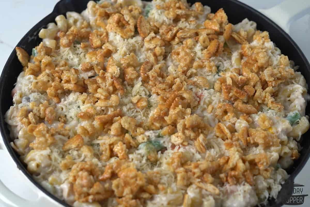 ritz cracker crumbles and cheese topping the casserole