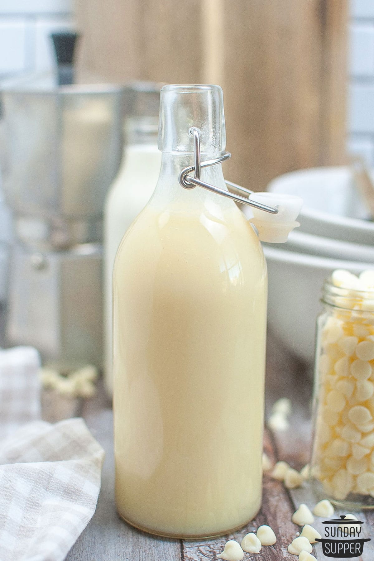 white chocolate sauce in a syrup bottle
