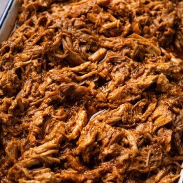 a serving tray filled with instant pot pulled pork