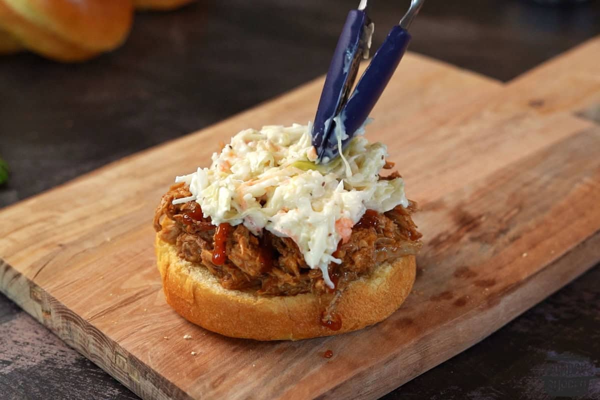 topping pulled pork with coleslaw