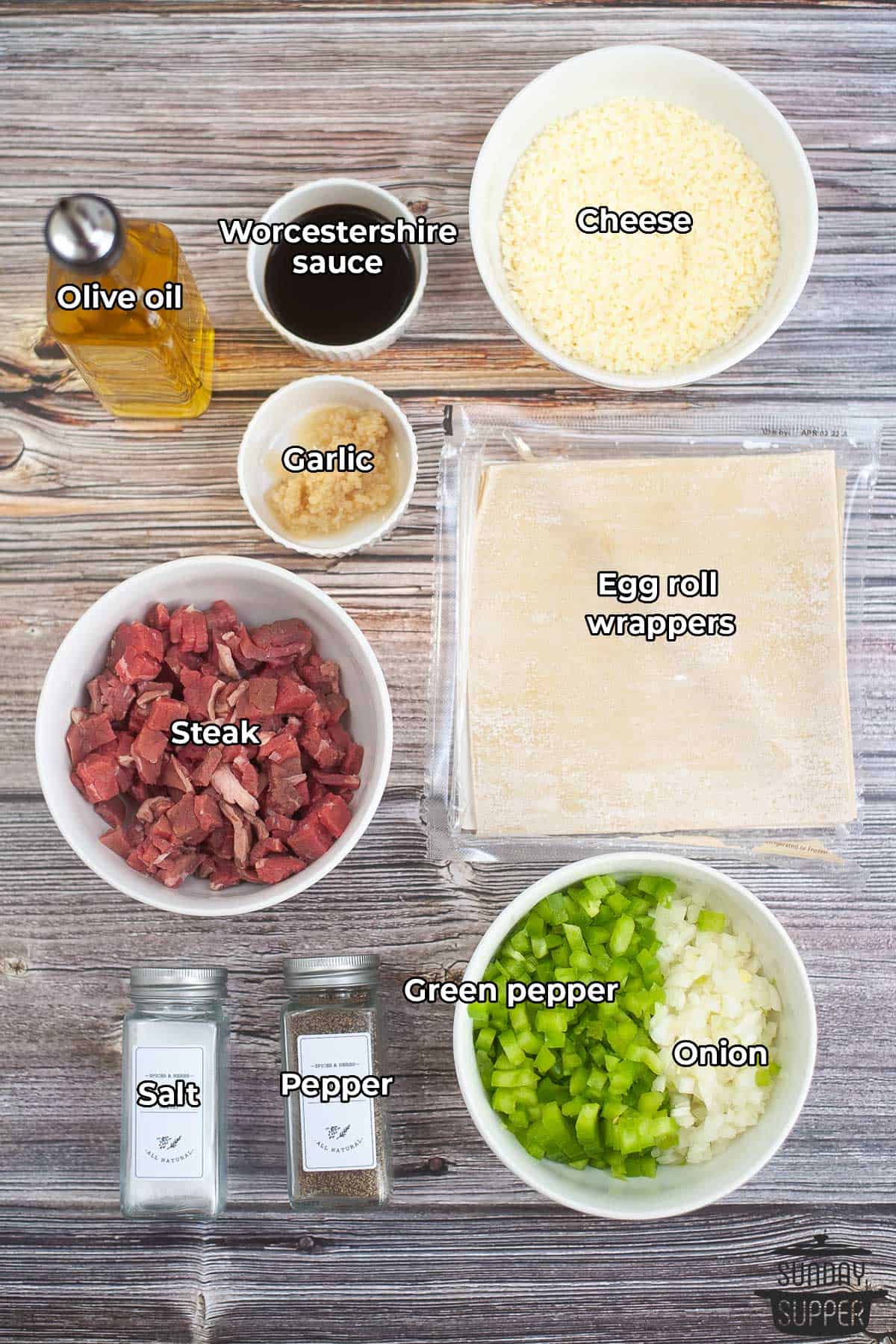 all the ingredients for steak egg rolls with labels