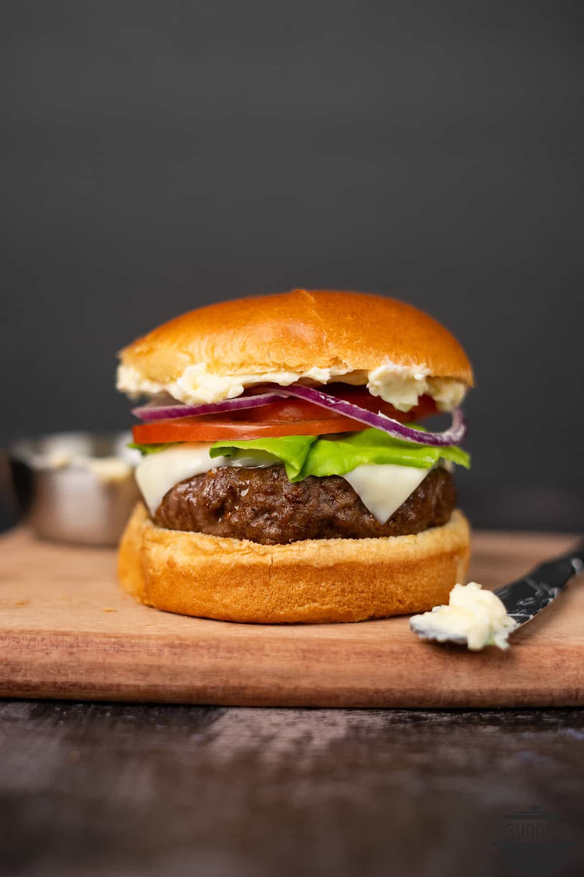 air fryer burger on a cutting board