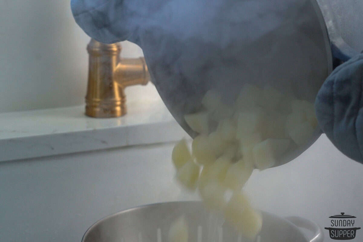 draining potatoes