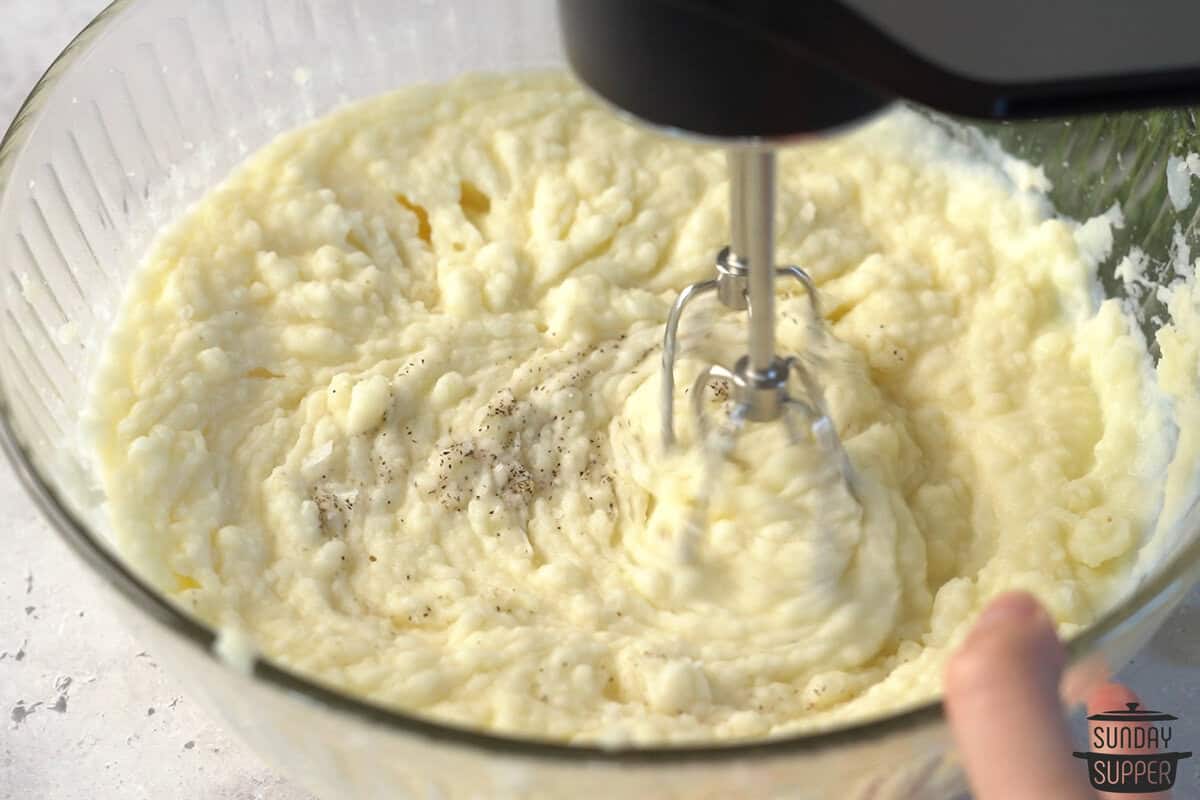 adding mashed potatoes