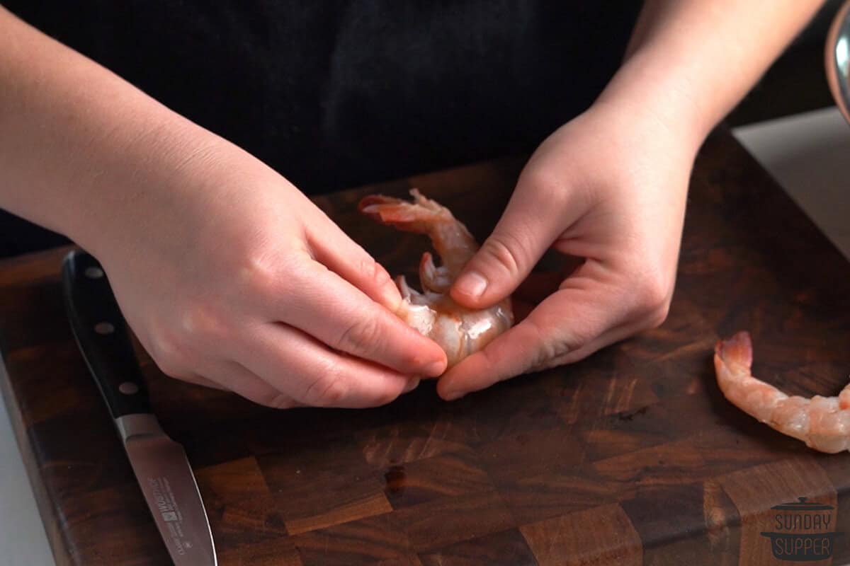 cracking the shell of the shrimp