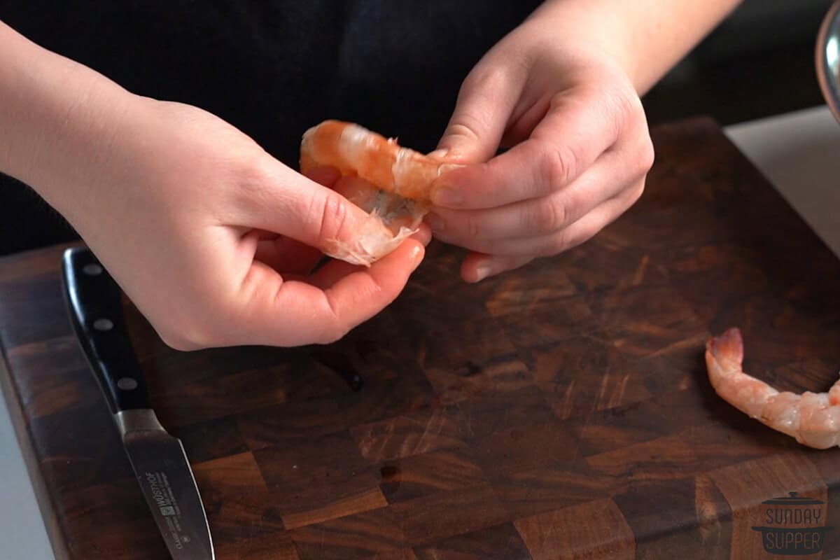 peeling the shrimp shell off