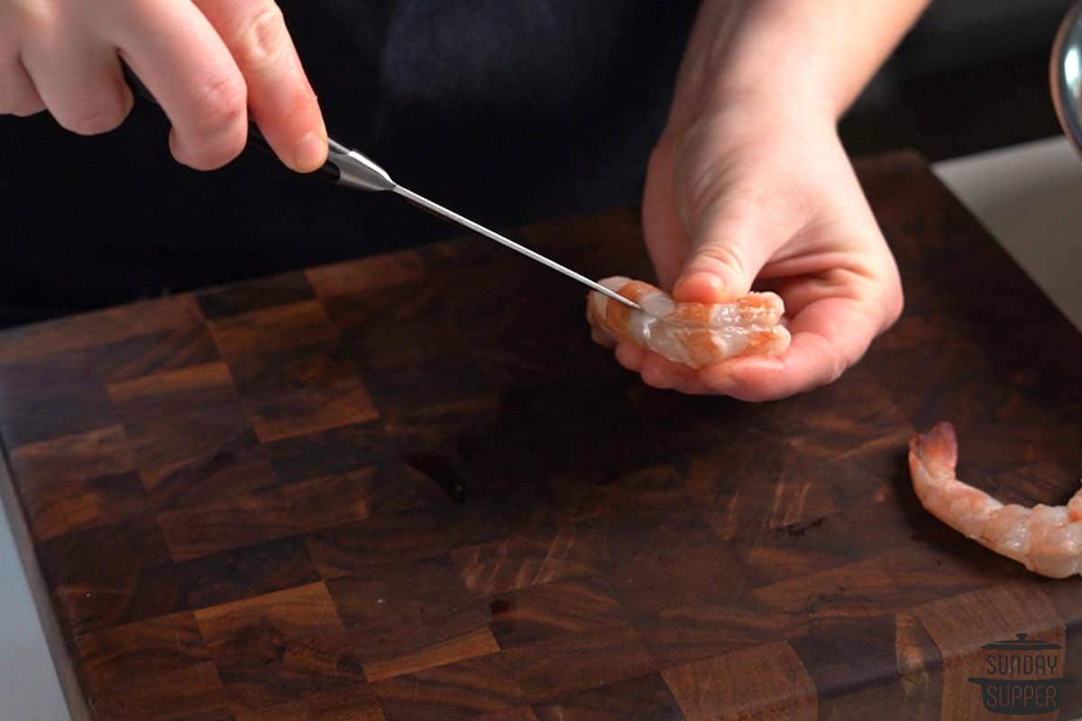 slicing a shrimp open