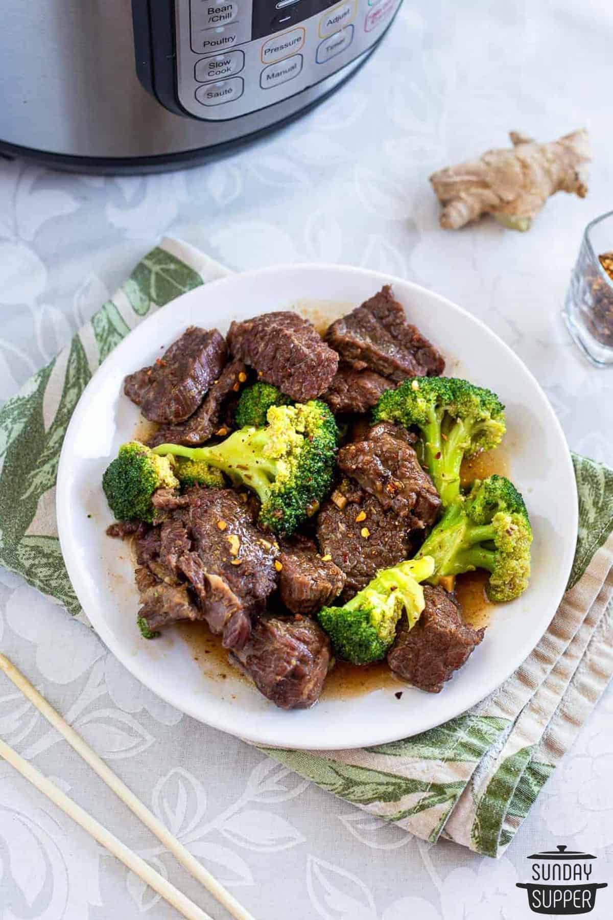 a plate of instant pot chinese beef and broccoli