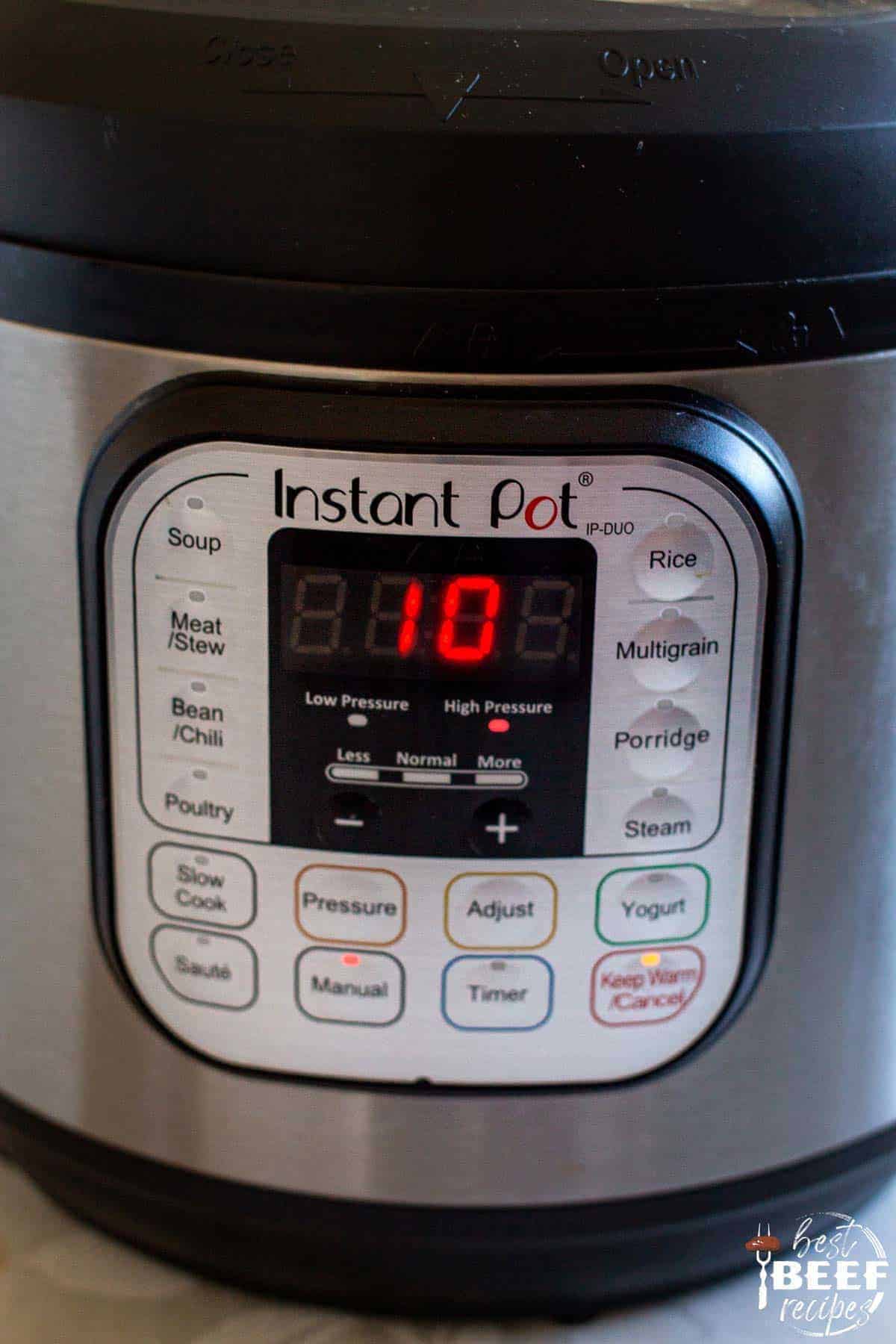 the instant pot showing 10 minutes of high pressure