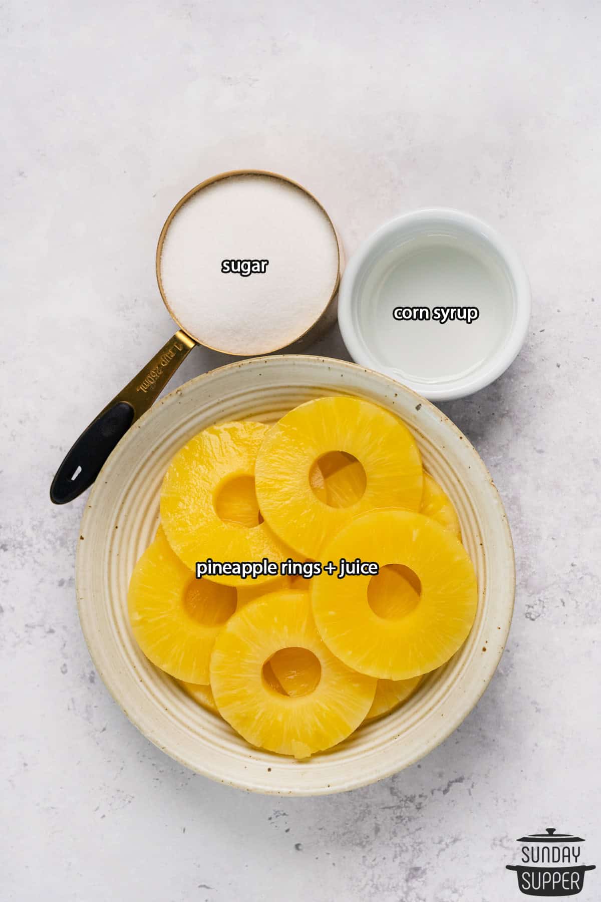 the ingredients for candied pineapple with labels