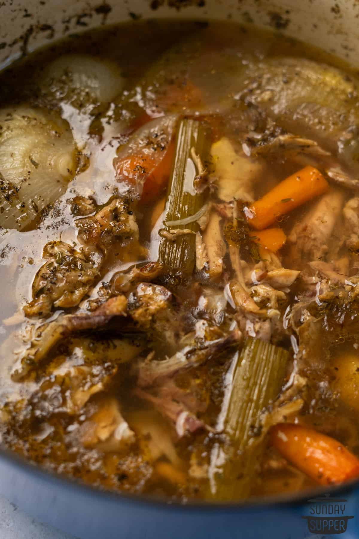 a pot full of bone broth before straining