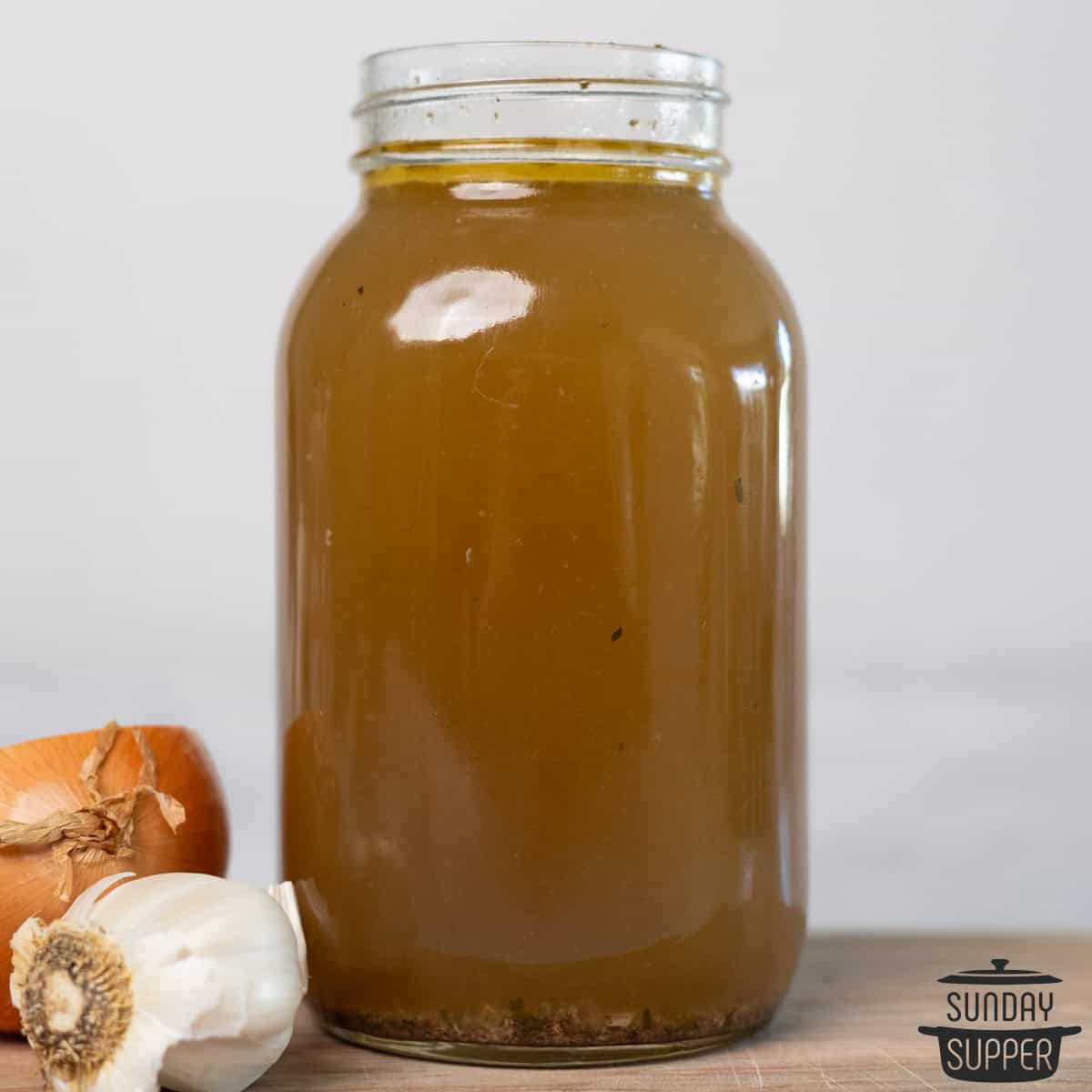 bone broth poured into a jar