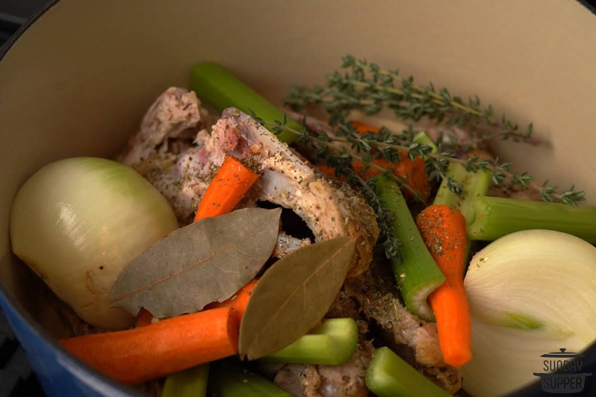 the vegetables and seasonings added to the pot