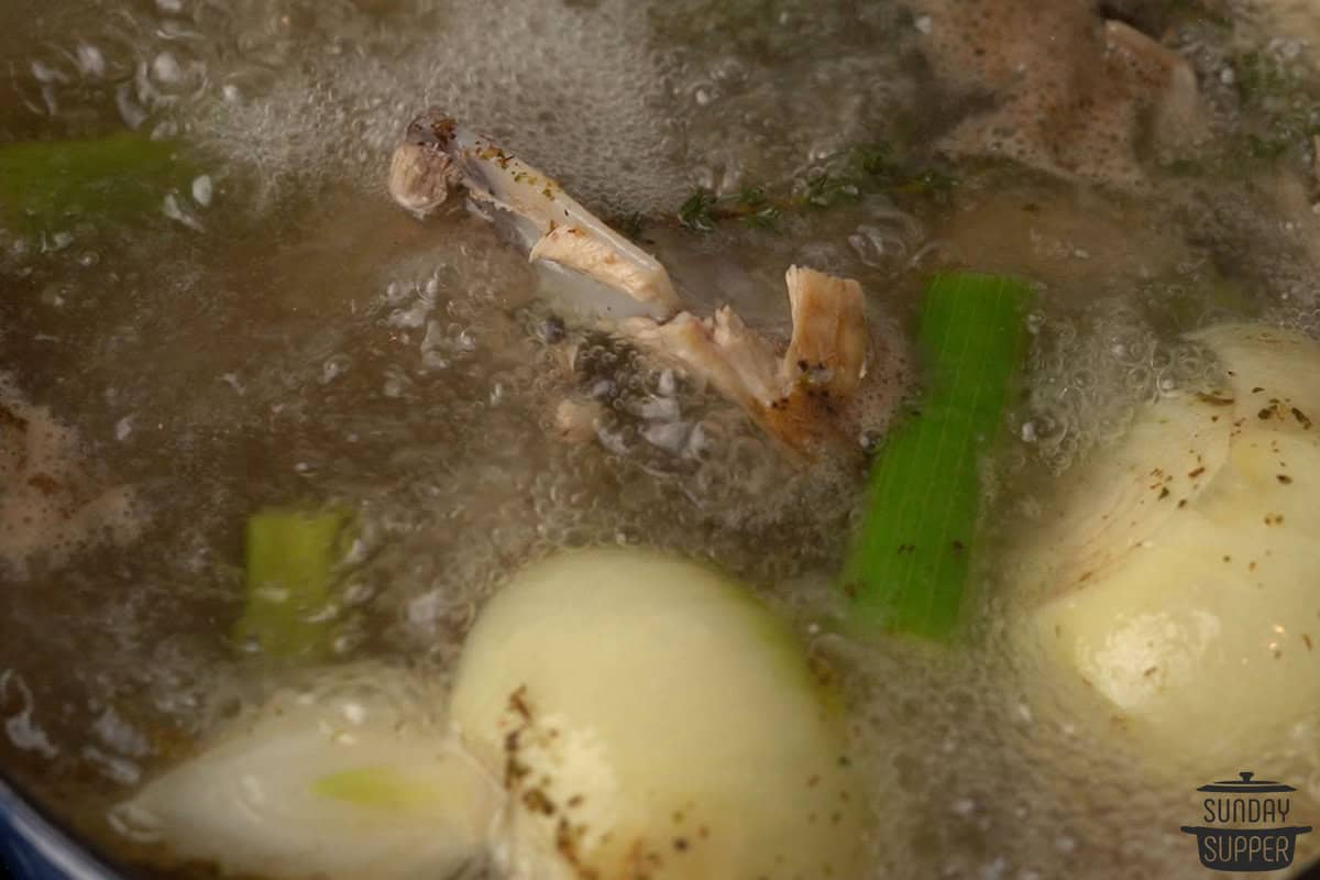 bringing the bone broth to a boil