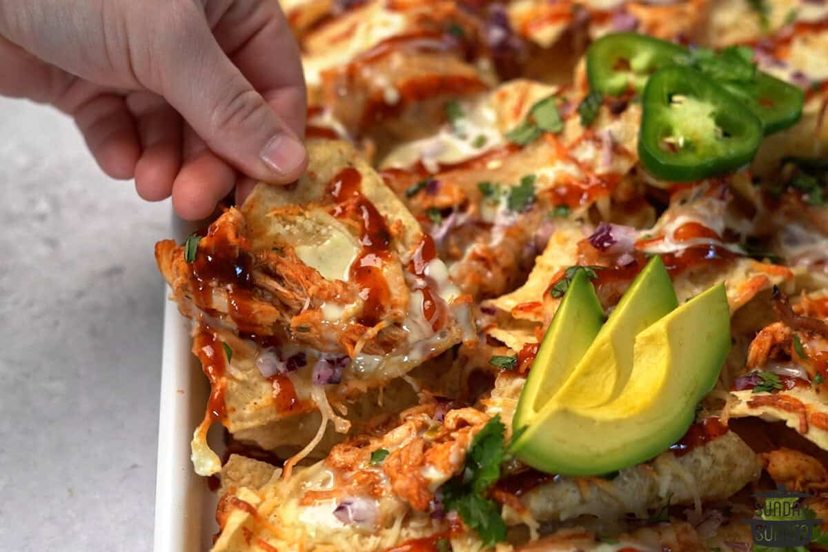 fully baked chicken nachos with toppings