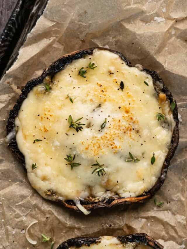 close up of one cheese stuffed portobello mushroom