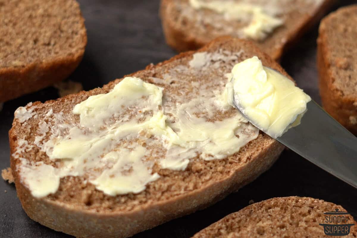 sliced sprouted bread with butter