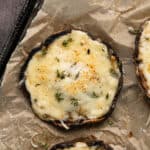 close up of one cheese stuffed portobello mushroom