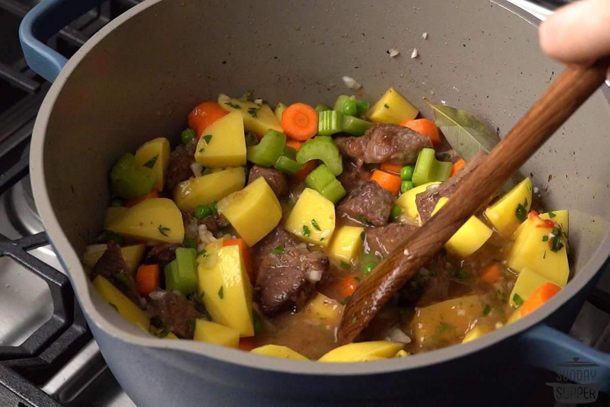 all of the ingredients added to the pot and stirred