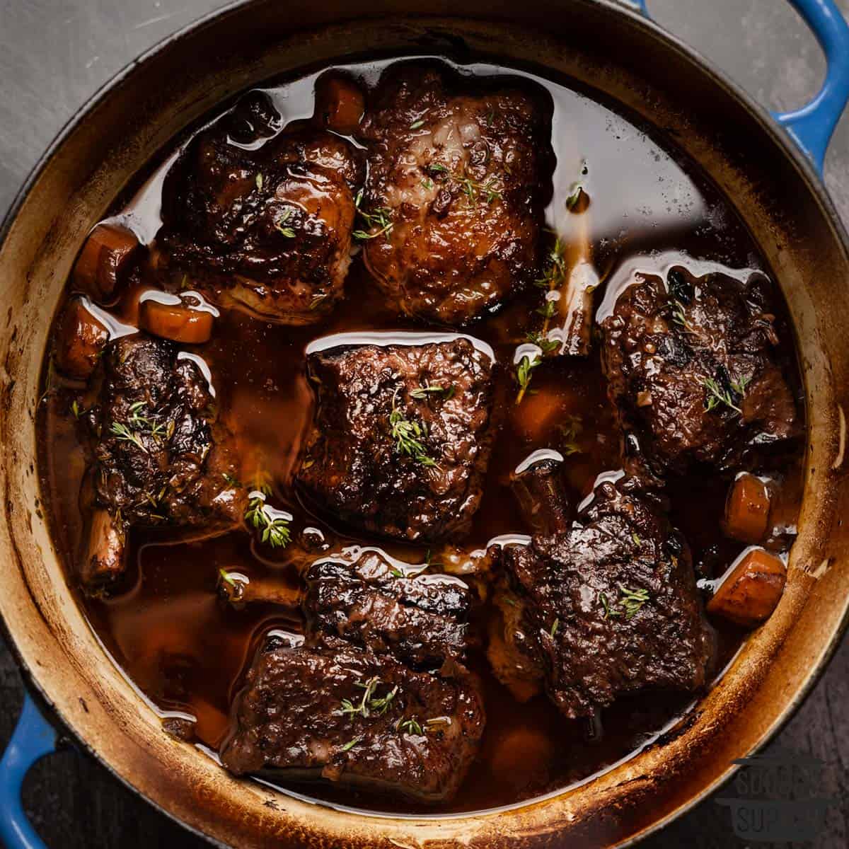 beef short ribs cooked in a pot of broth