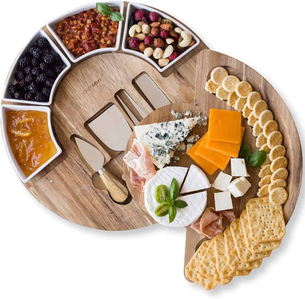 acacia wood cheese board, round with charcuterie on display