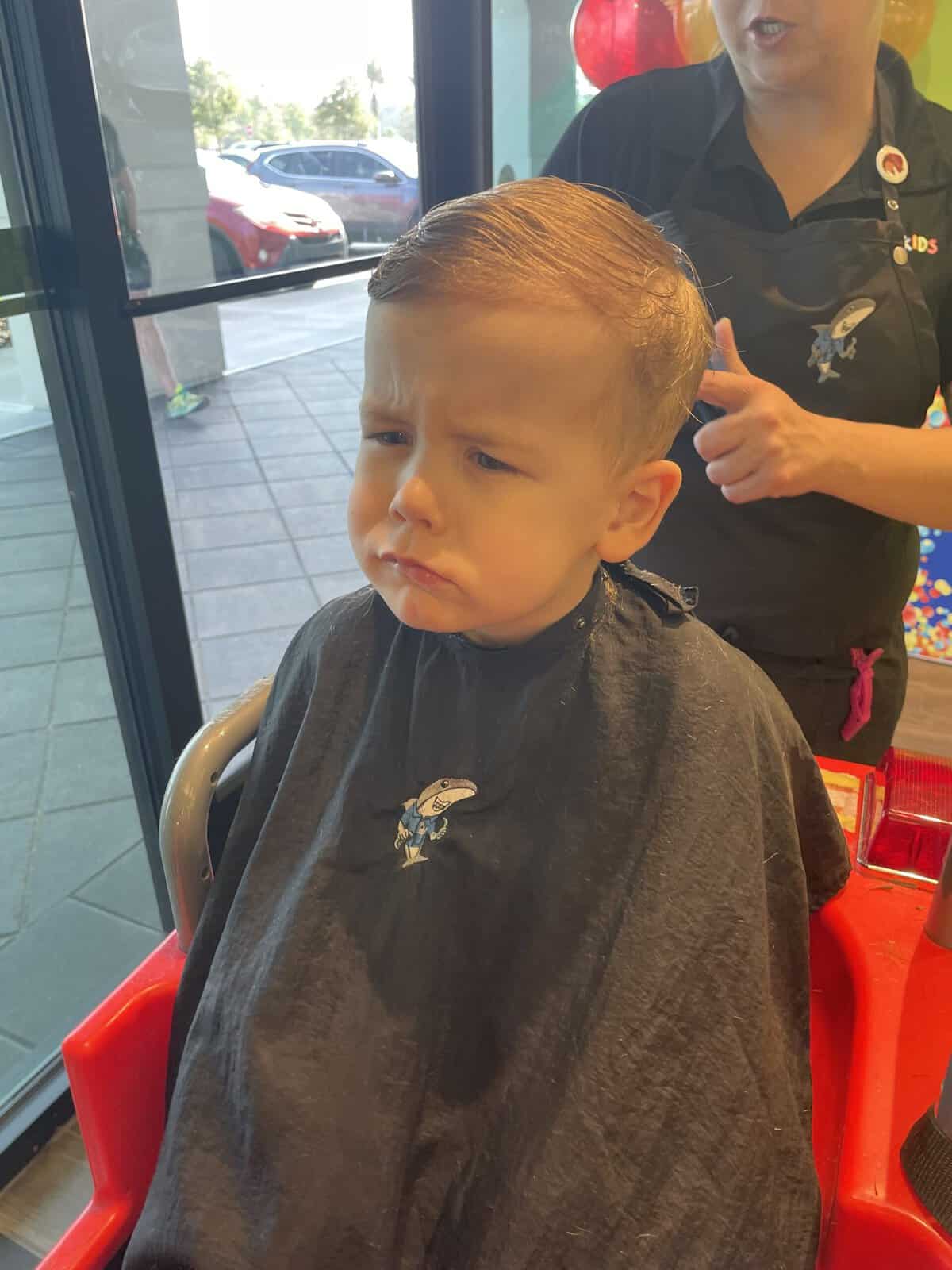 aiden getting his hair cut