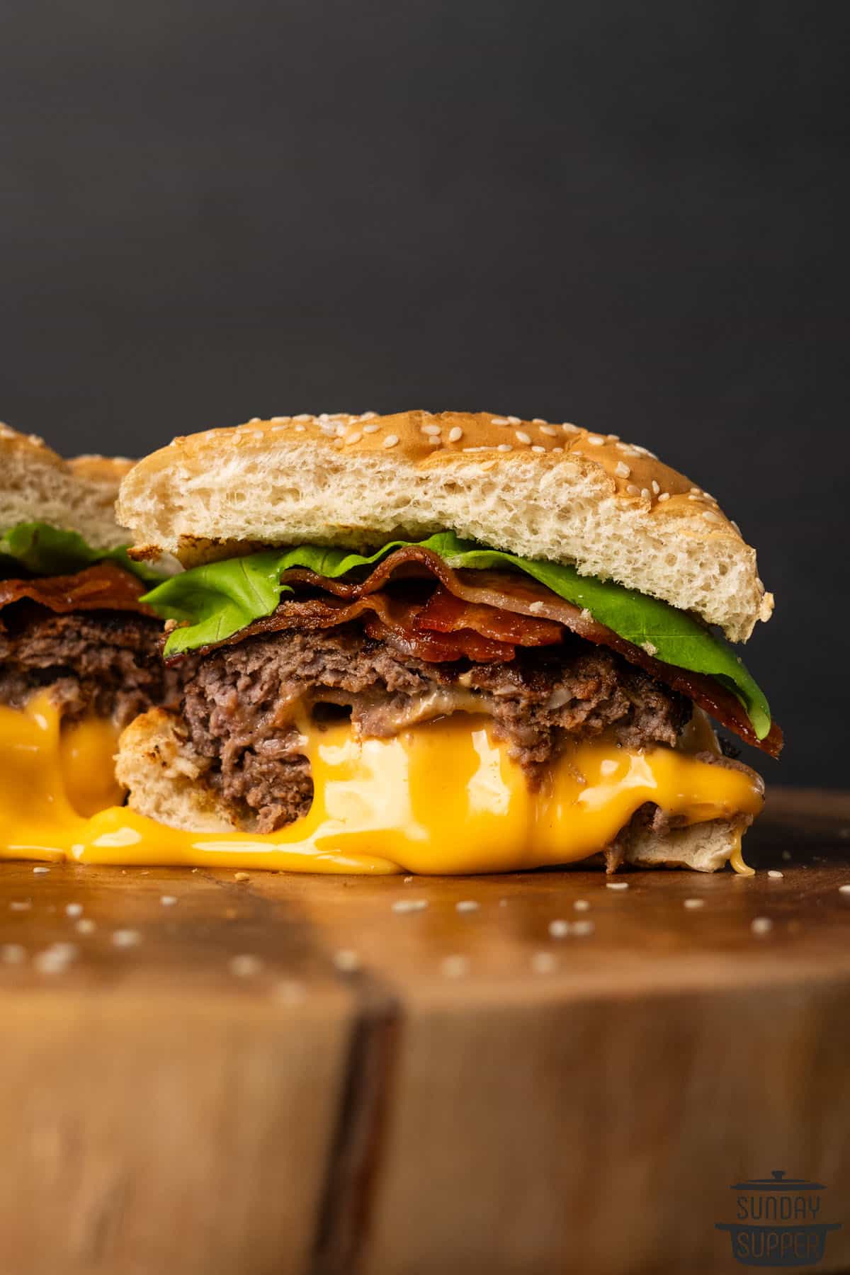 a cut in half stuffed cheeseburger