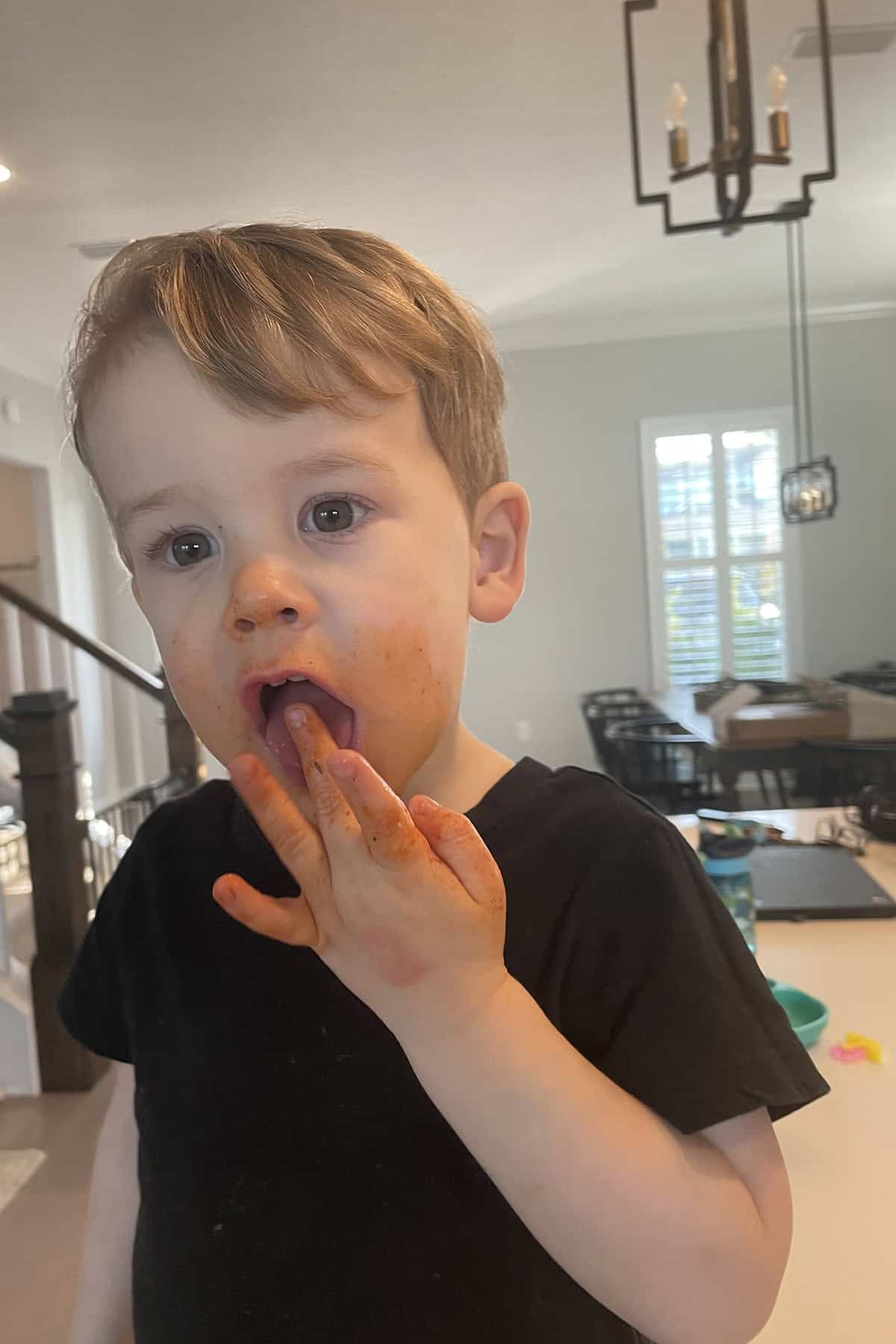 Aiden enjoying spaghetti and meatballs