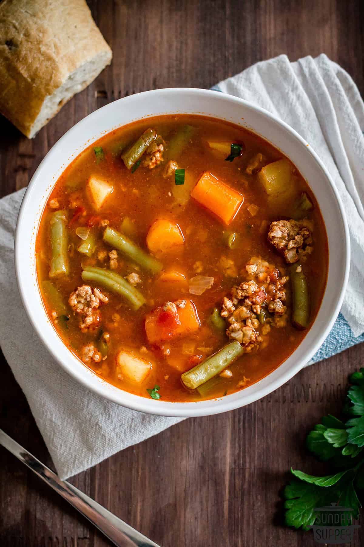 instant pot hamburger soup in a white bowl