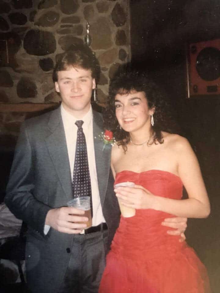 ron and isabel standing side-by-side in freshman year of college