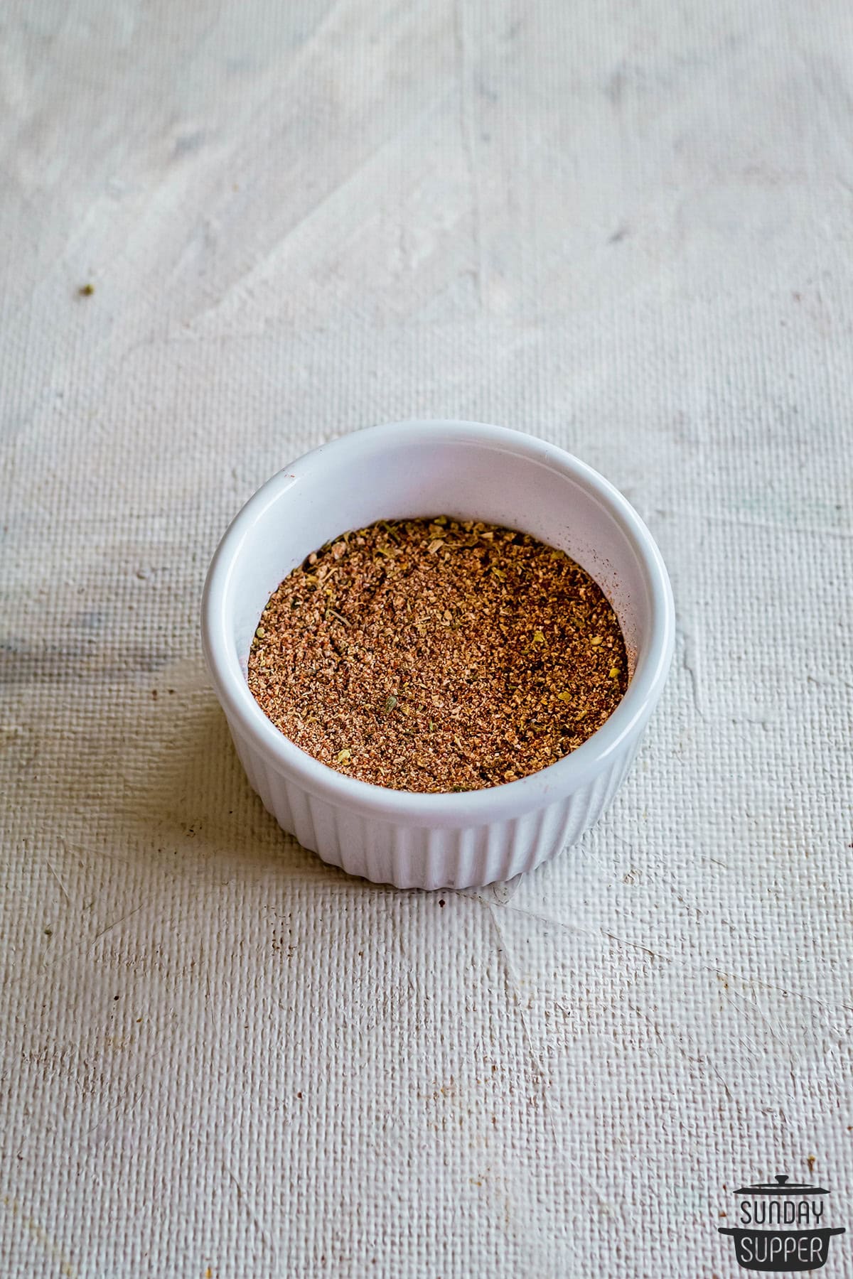 meatloaf seasoning in a small ramekin