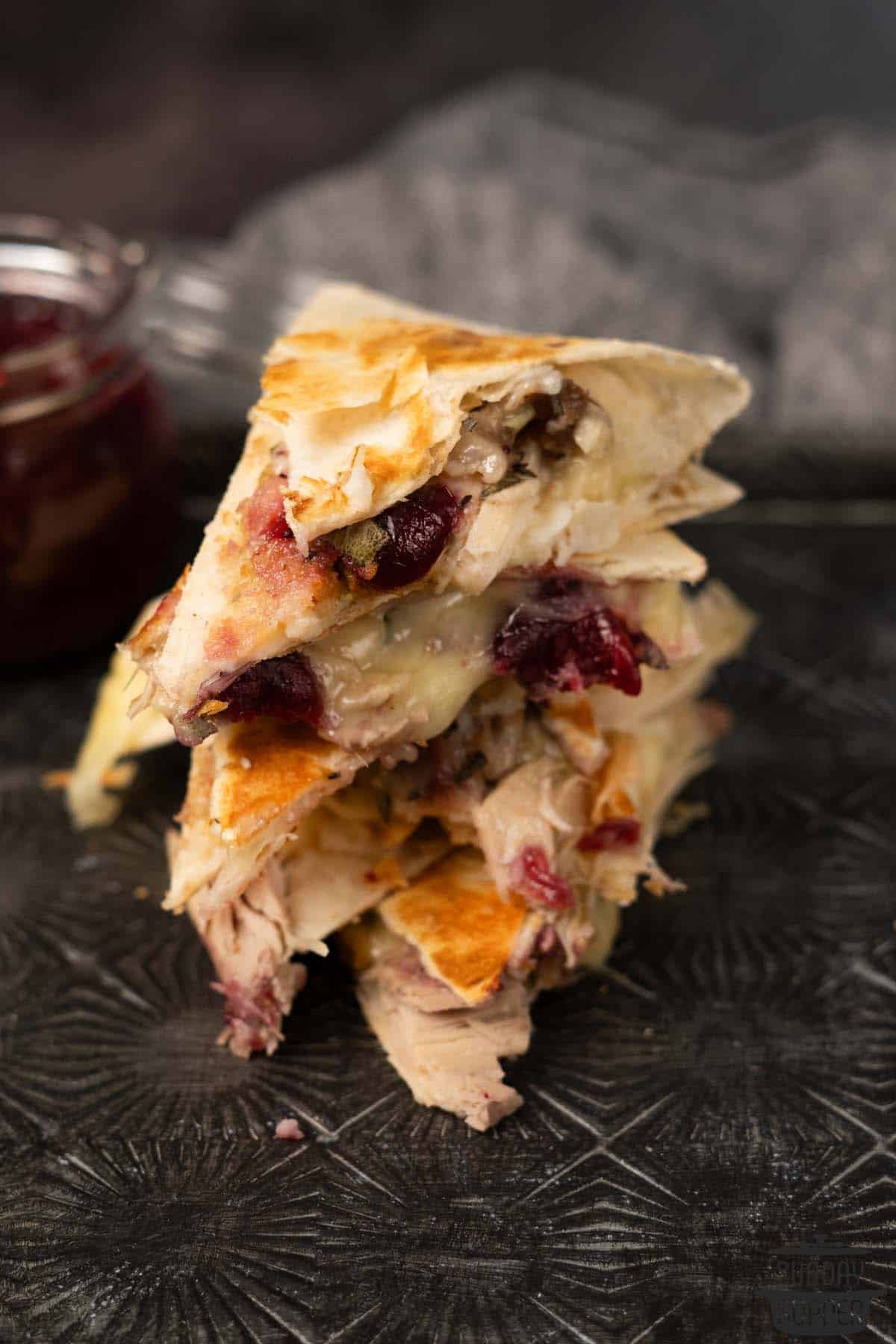 slices of turkey quesadilla on a serving platter