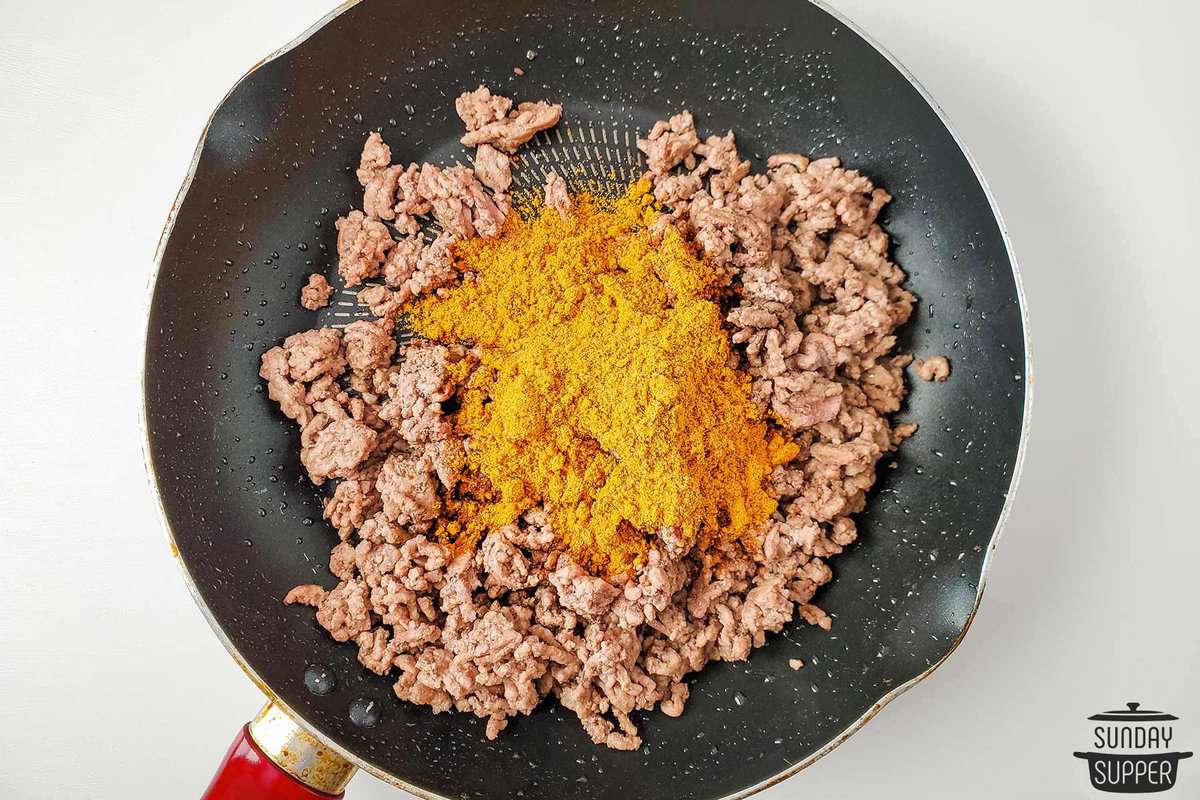 ground beef and seasonings in a pan