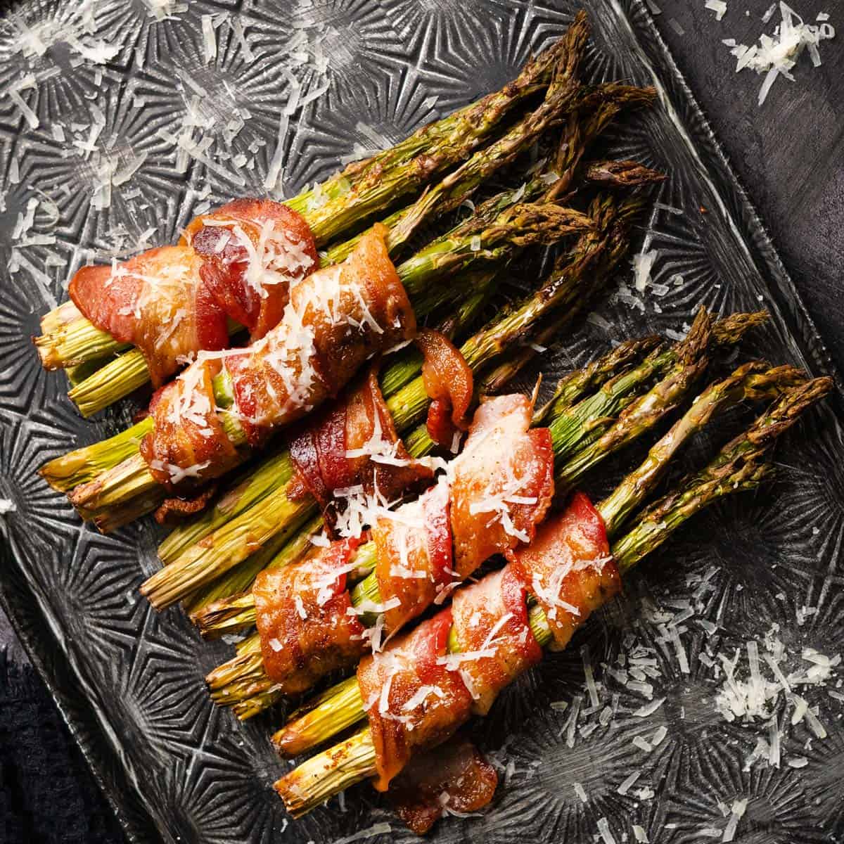 bundles of bacon wrapped asparagus with parmesan