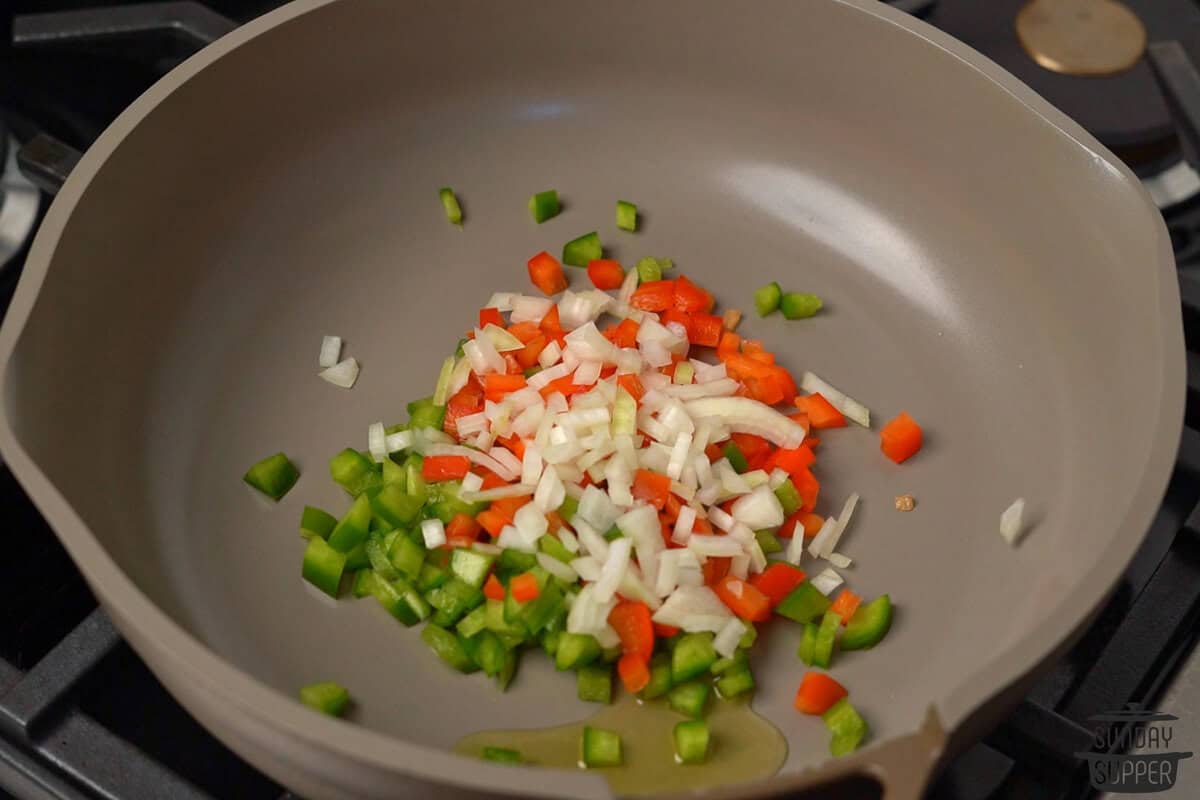 half the oil and the veggies added to the pan to saute